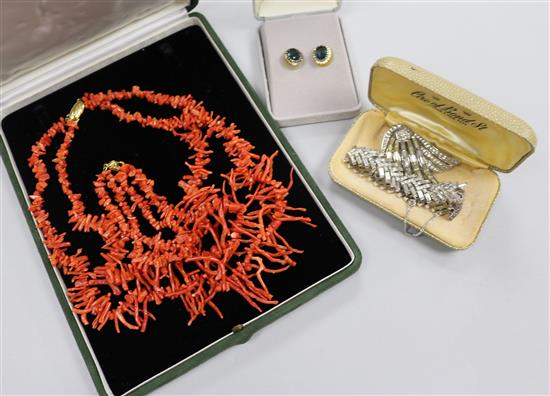 A coral necklace, a costume bracelet, brooch and pair of earrings.